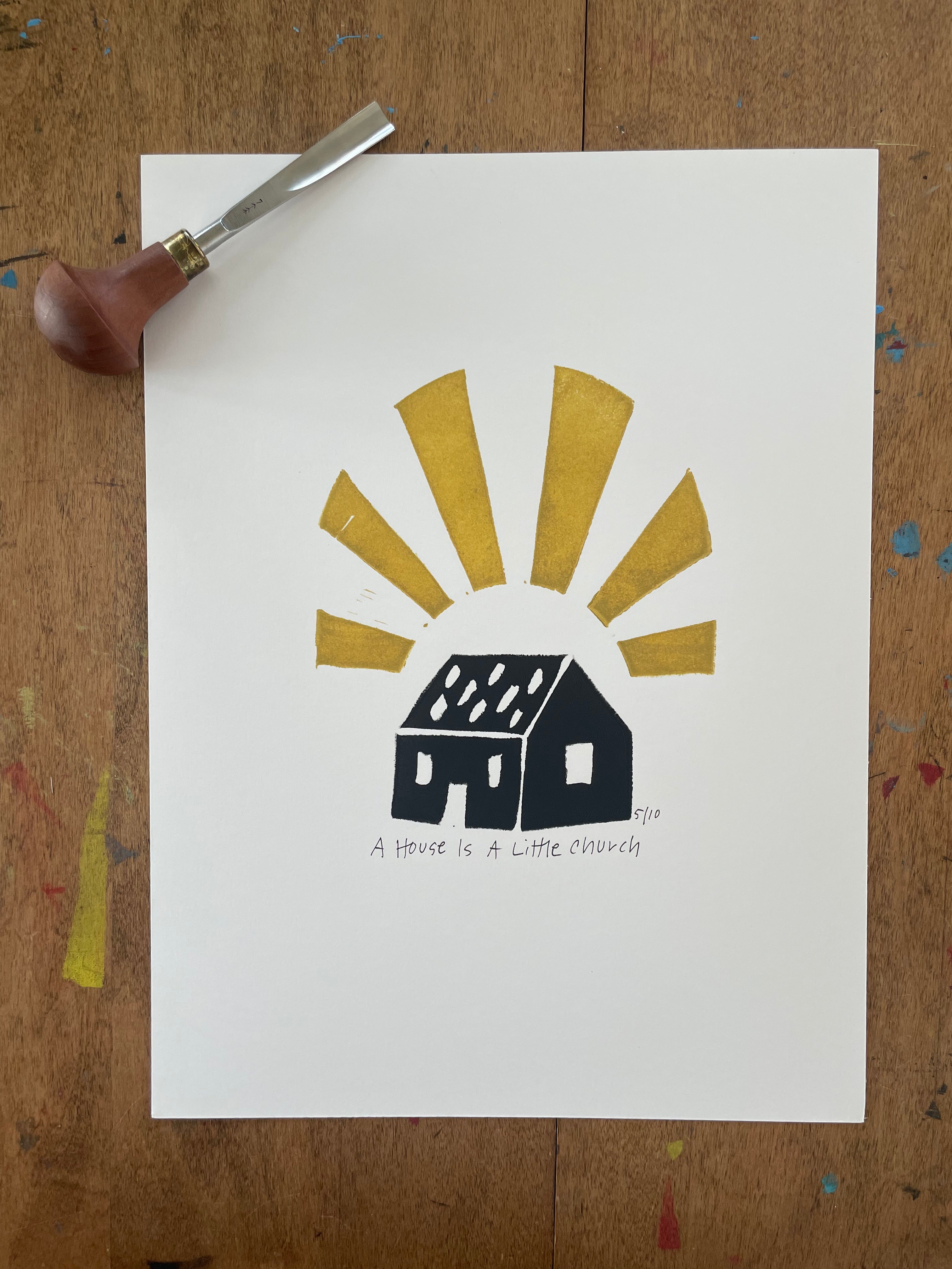 image of a house with sunbeams coming out