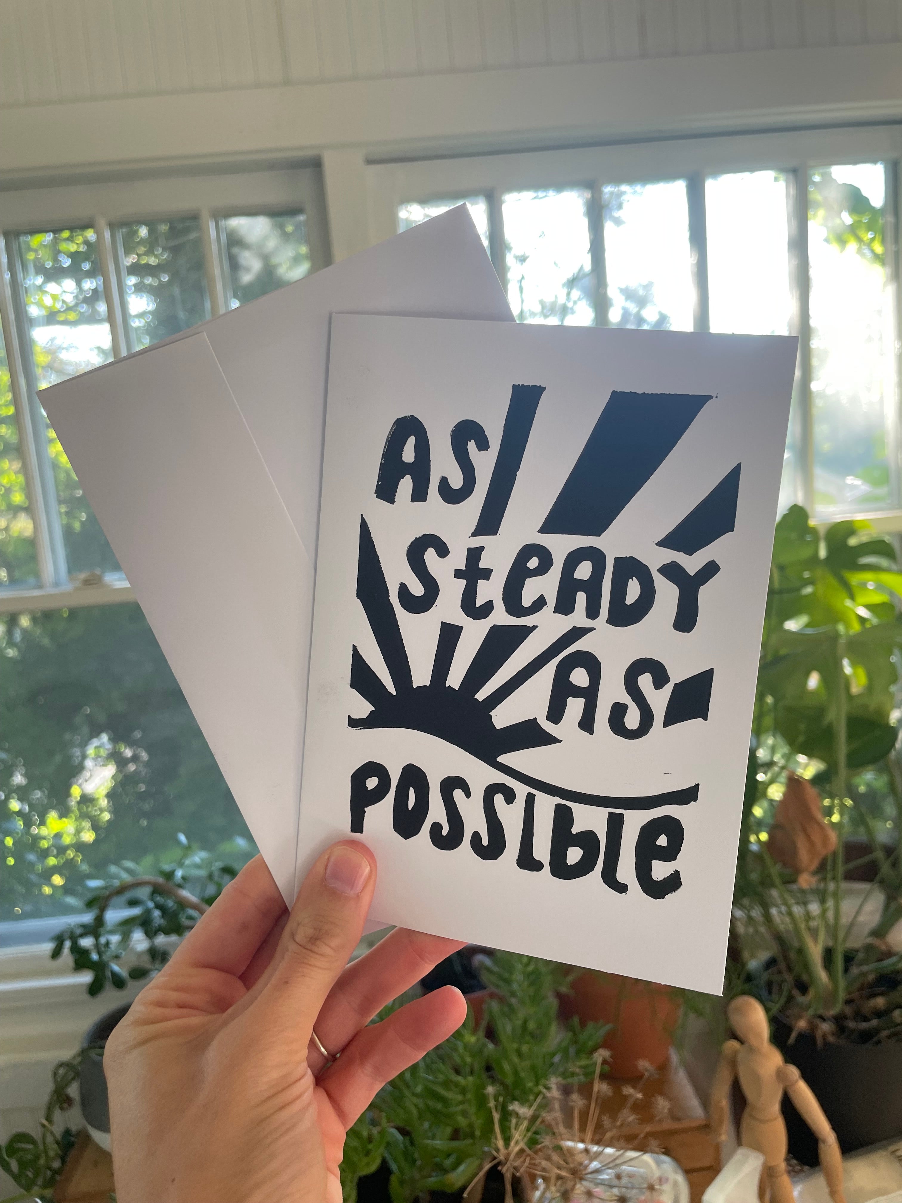 card with words as steady as possible