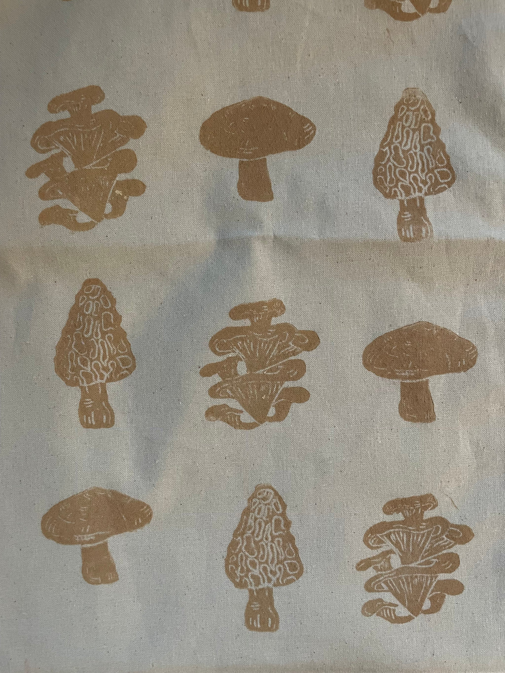 Mushrooms handprinted on tote bag
